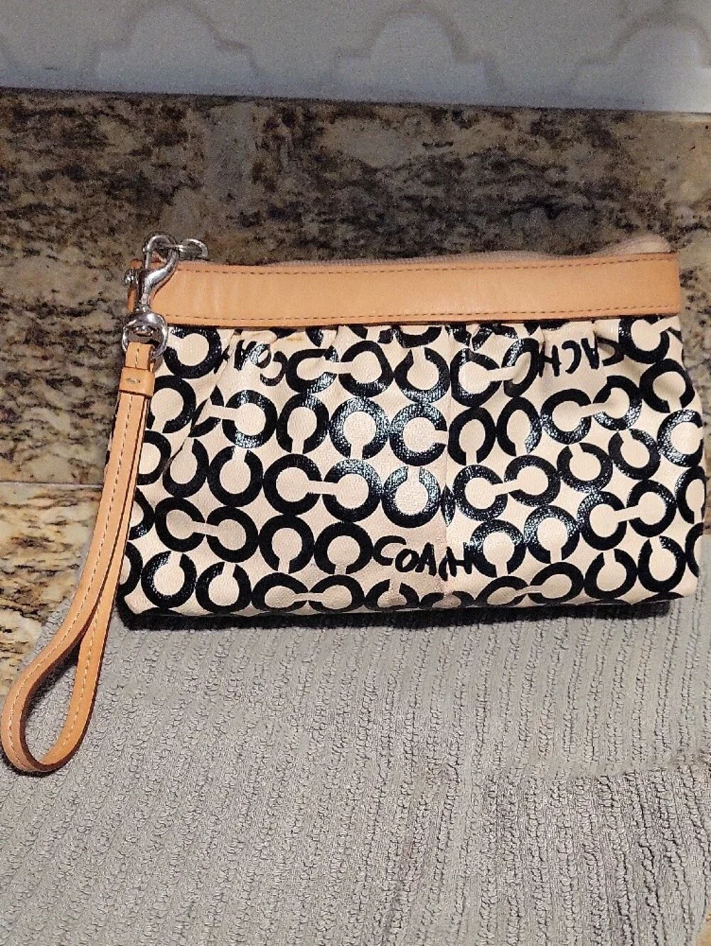 Coach Black and Cream Signature C Canvas Wristlet with Tan Leather Trim